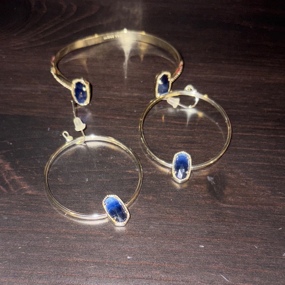 Kendra Scott earrings and cuff bracelet